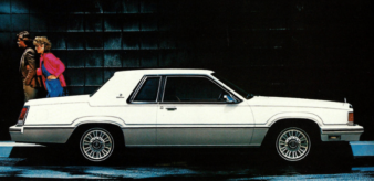 Despite her more than adequate shoulder pads, Brenda still got appendicitis. motor meme