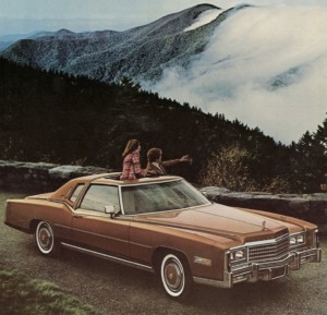 He: “Right over there is the Overlook Hotel where our interior design team enraged the dead with inappropriate carpet choices.” motor meme